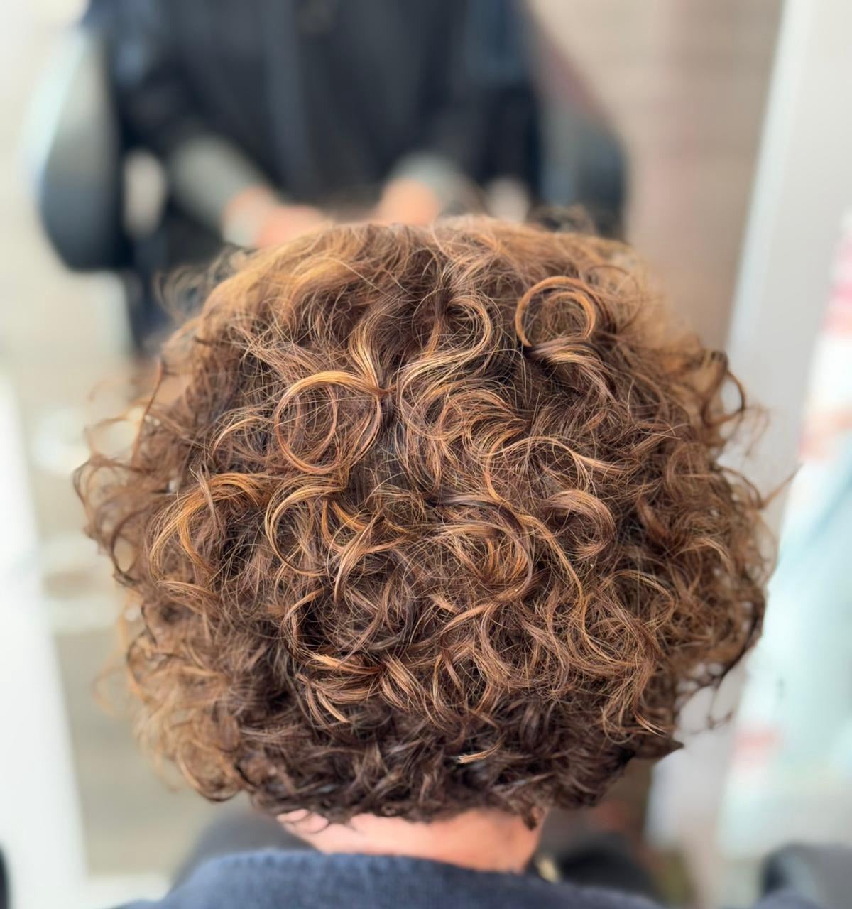 caramel lowlights with natural curly hair
